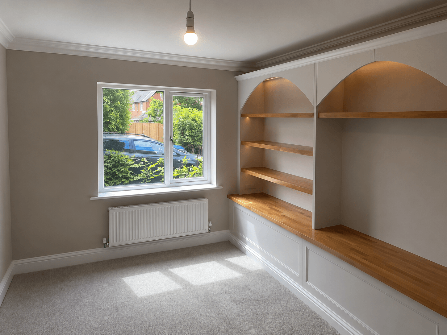 Painted fitted shelving, cabinetry and interior woodwork